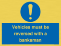 vehicles-must-be-reversed-with-a-banksman~